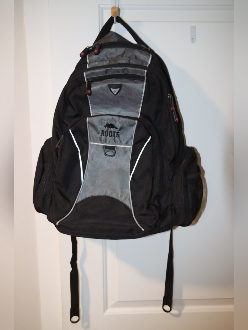 Roots Black and Gray Travel Backpack with Red Accents